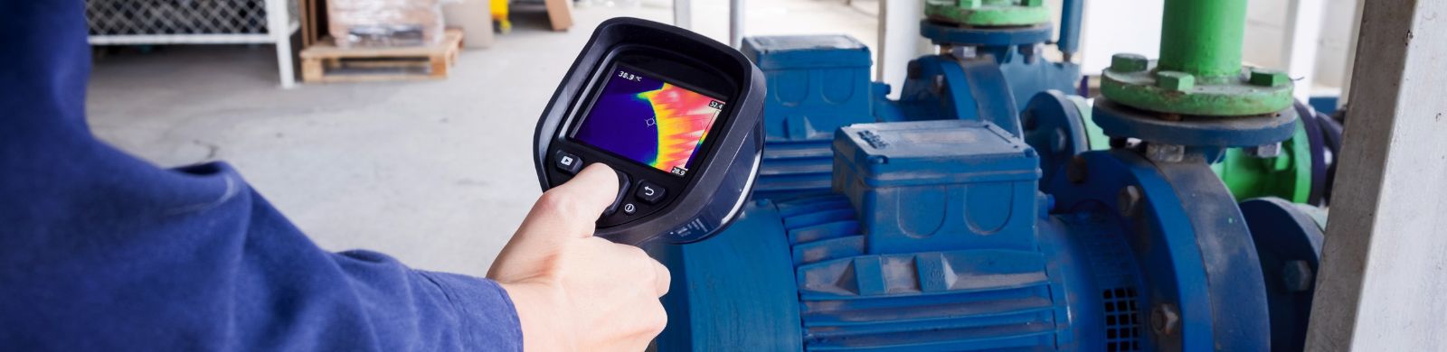 technician use thermal imaging camera to check temperature in factory technician use thermal imaging camera to check temperature in factory