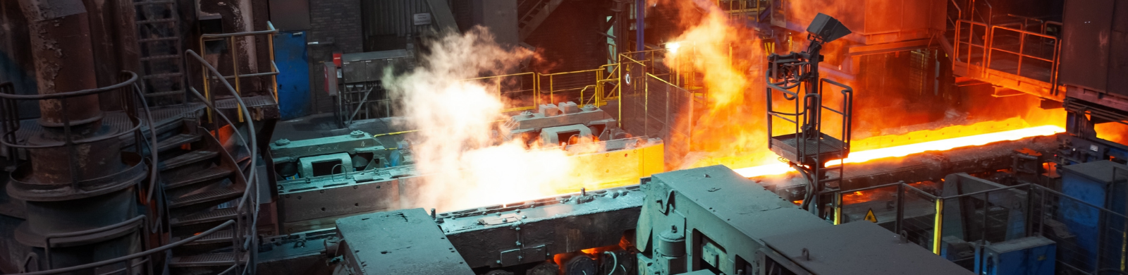 Steel mill production line with hot steel and industrial equipment Steel mill production line with hot steel and industrial equipment